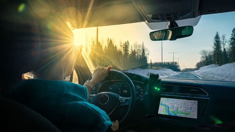 An EV driver on a wintery road