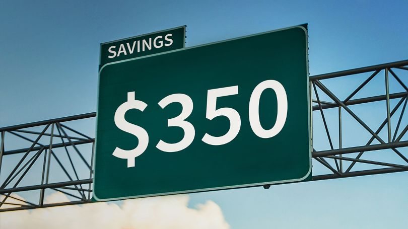 A highway sign with the amount of savings from Aviva Journey 