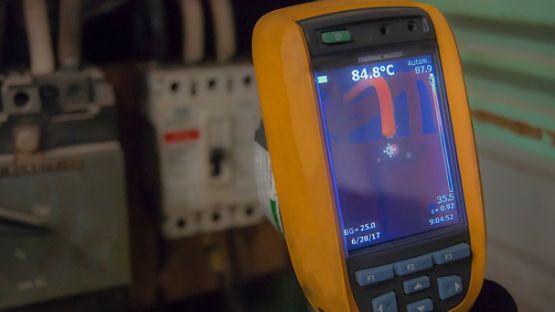 Infrared camera detects a high temperature of an electrical circuit breaker