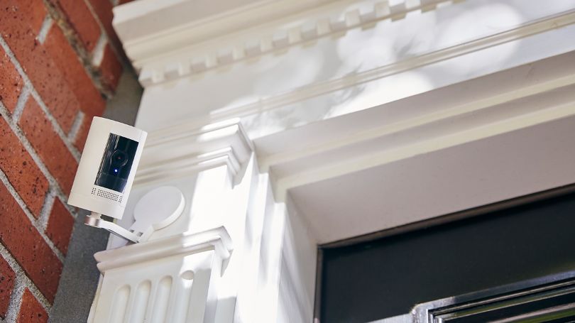 Angle shot of a smart home security camera looking at front of home