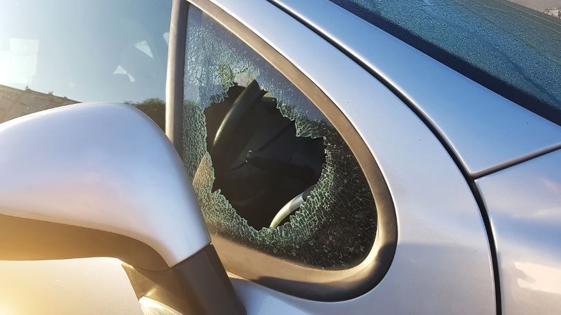 Smashed side quarter glass car window