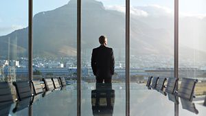 CEO looking out of office window