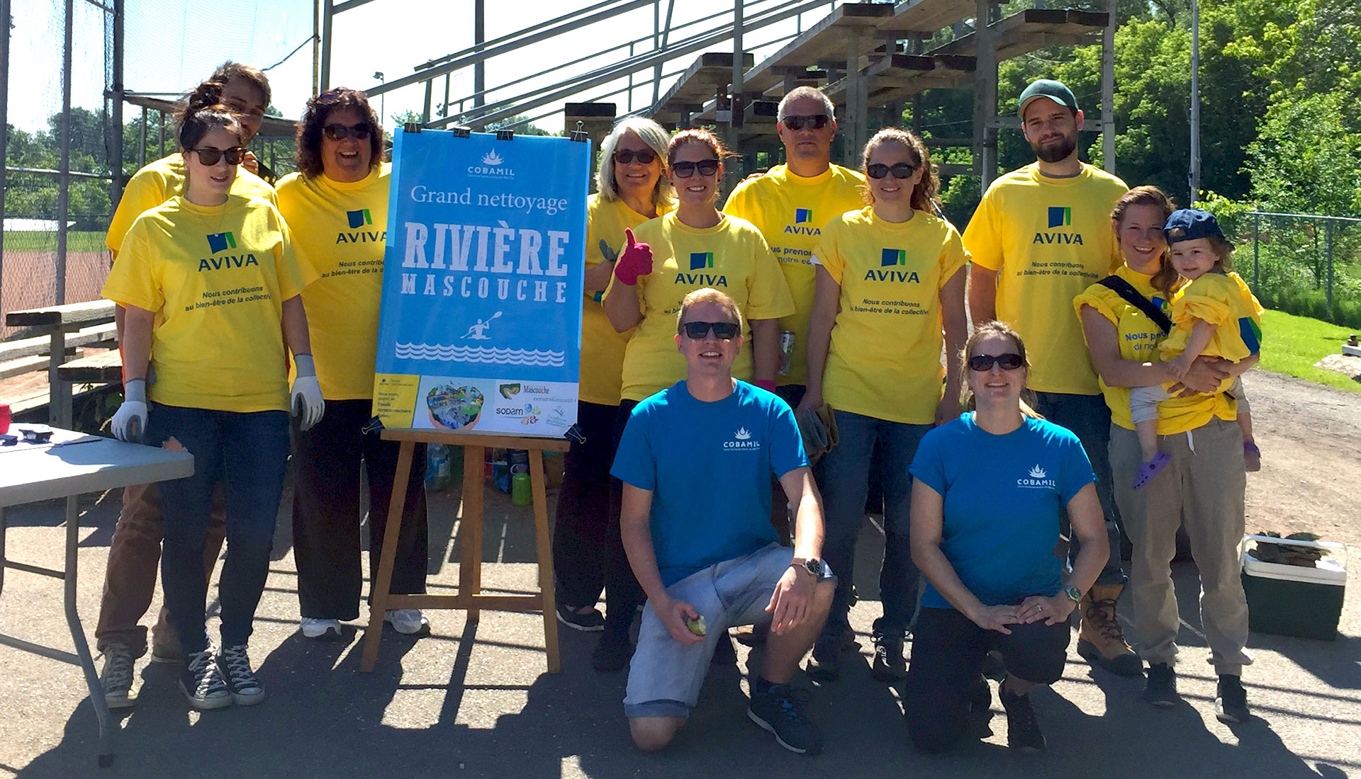 Charity representatives at the river cleanup in Quebec
