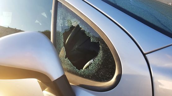 Smashed side quarter glass car window
